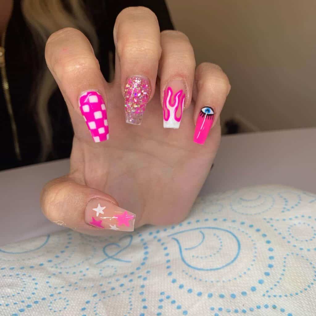 Explore a variety of pink nail designs, from bright and cute styles to festive Christmas nails with intricate patterns and decorations.