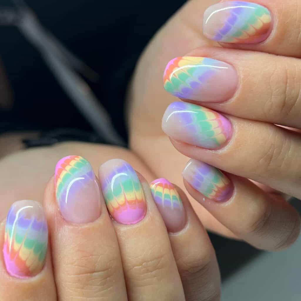 A collection of vibrant and artistic summer nail art on impeccably groomed nails.