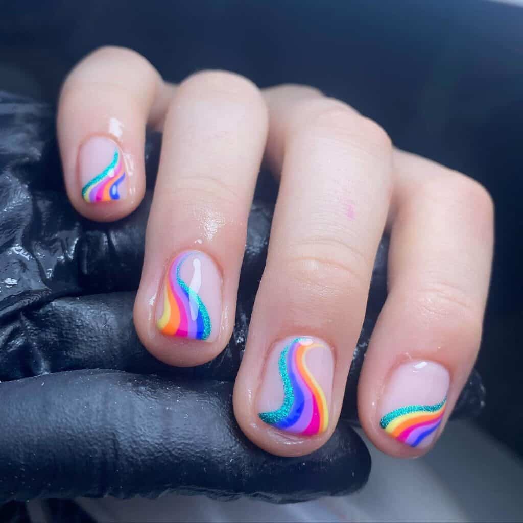 A collection of vibrant and artistic summer nail art on impeccably groomed nails.