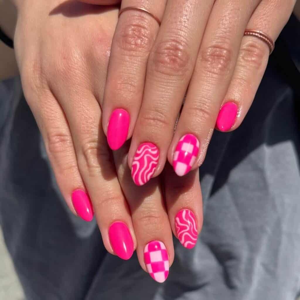 Explore a variety of pink nail designs, from bright and cute styles to festive Christmas nails with intricate patterns and decorations.