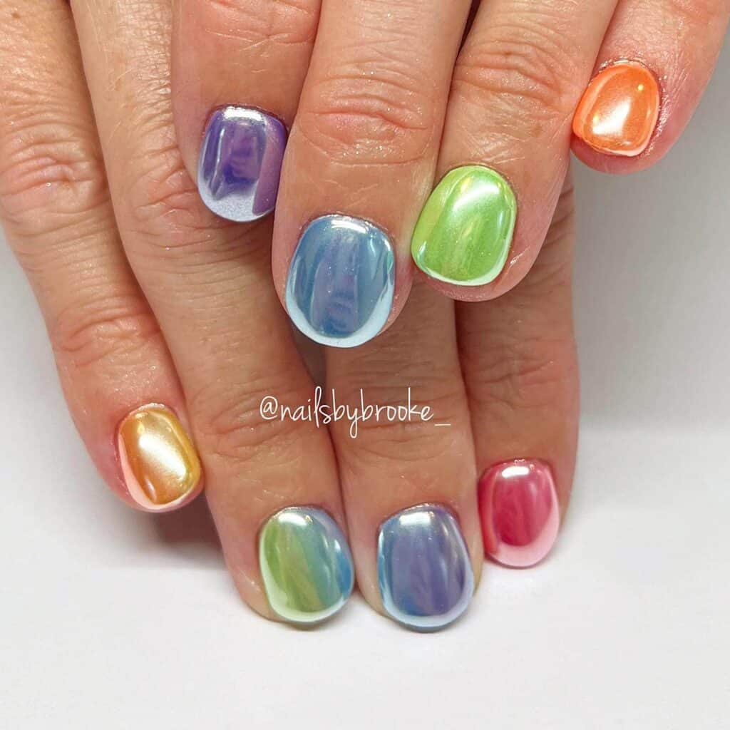 Cheerful and lively summer nail designs with bold hues of azure, rose, and lemon, showcasing seaside themes and flower motifs.