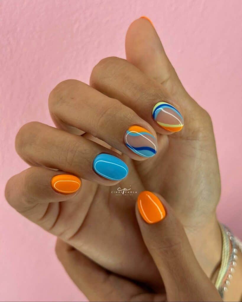 Cheerful and lively summer nail designs with bold hues of azure, rose, and lemon, showcasing seaside themes and flower motifs.