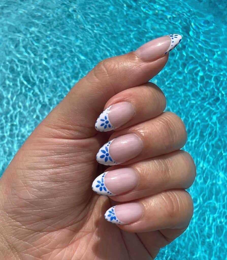 Cheerful and lively summer nail designs with bold hues of azure, rose, and lemon, showcasing seaside themes and flower motifs.