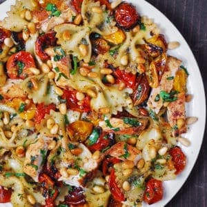 A vibrant array of freshly prepared pasta recipes, including spaghetti, penne, and fusilli, adorned with various sauces, herbs, and garnishes
