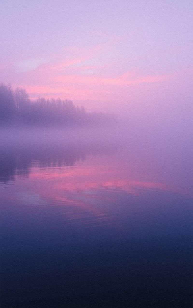 Sunrise Over Misty Lake with Pink Reflections