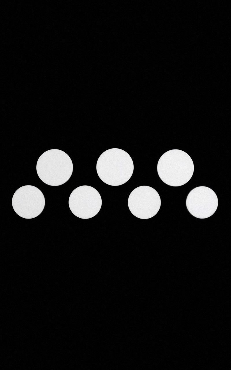 Minimalist White Moon Phases on Black Background