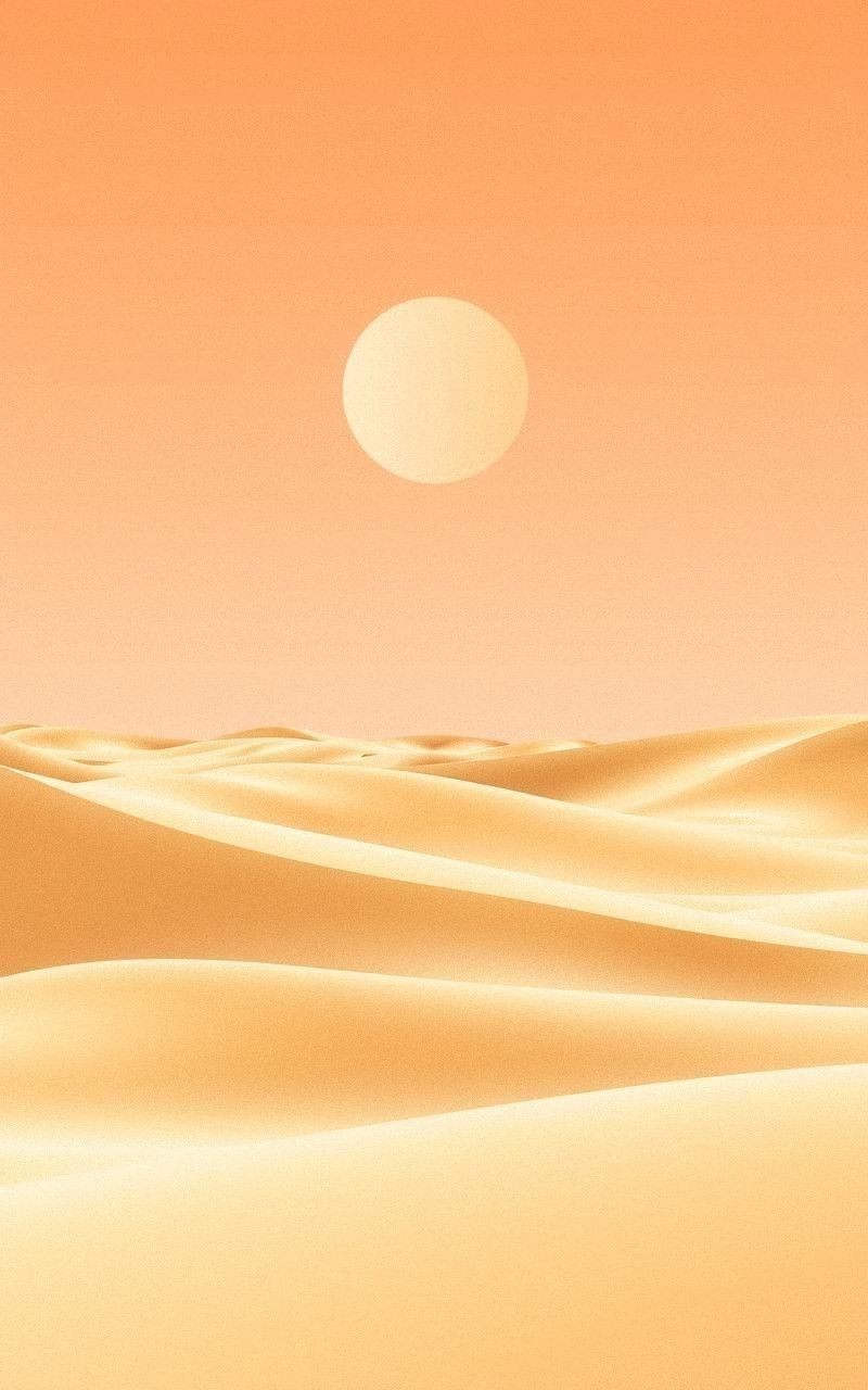 Calm Desert Dunes Under Soft Orange Sky