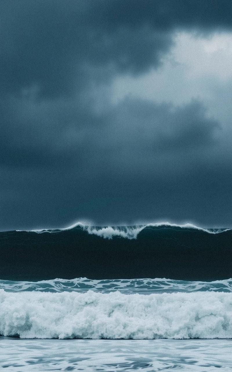 Majestic Rolling Waves Under Stormy Skies