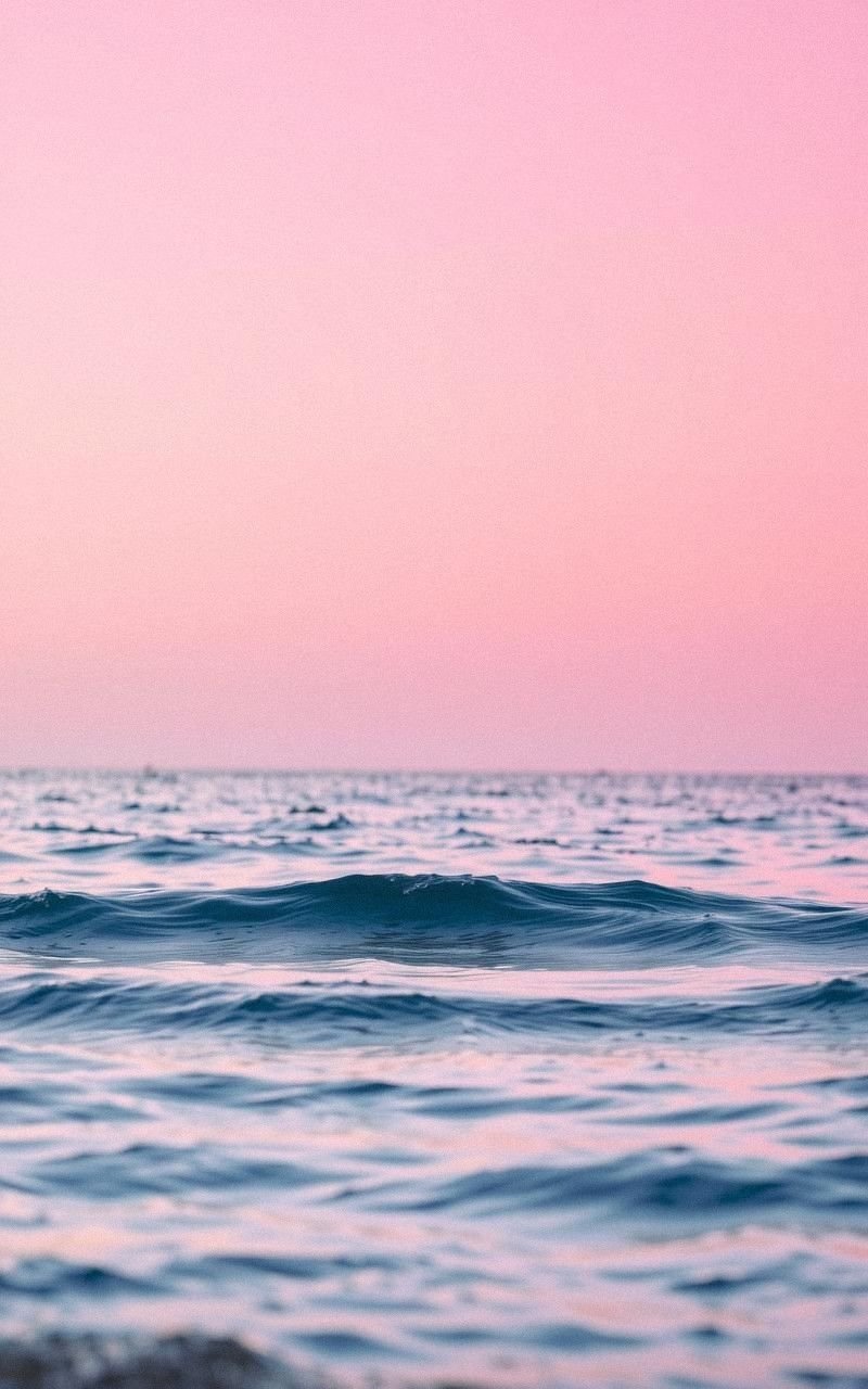 Ocean Waves with Soft Pink and Lavender Sky
