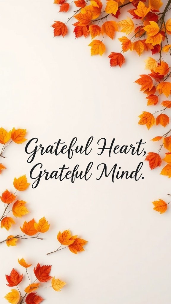 Wallpaper with the text 'Grateful Heart, Grateful Mind' surrounded by autumn leaves.