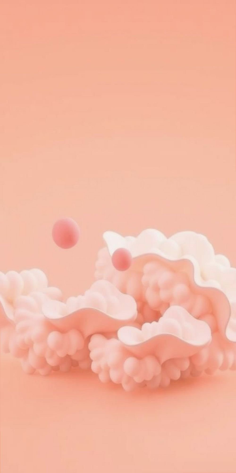 Coral Clouds Against A Soft Peach Background