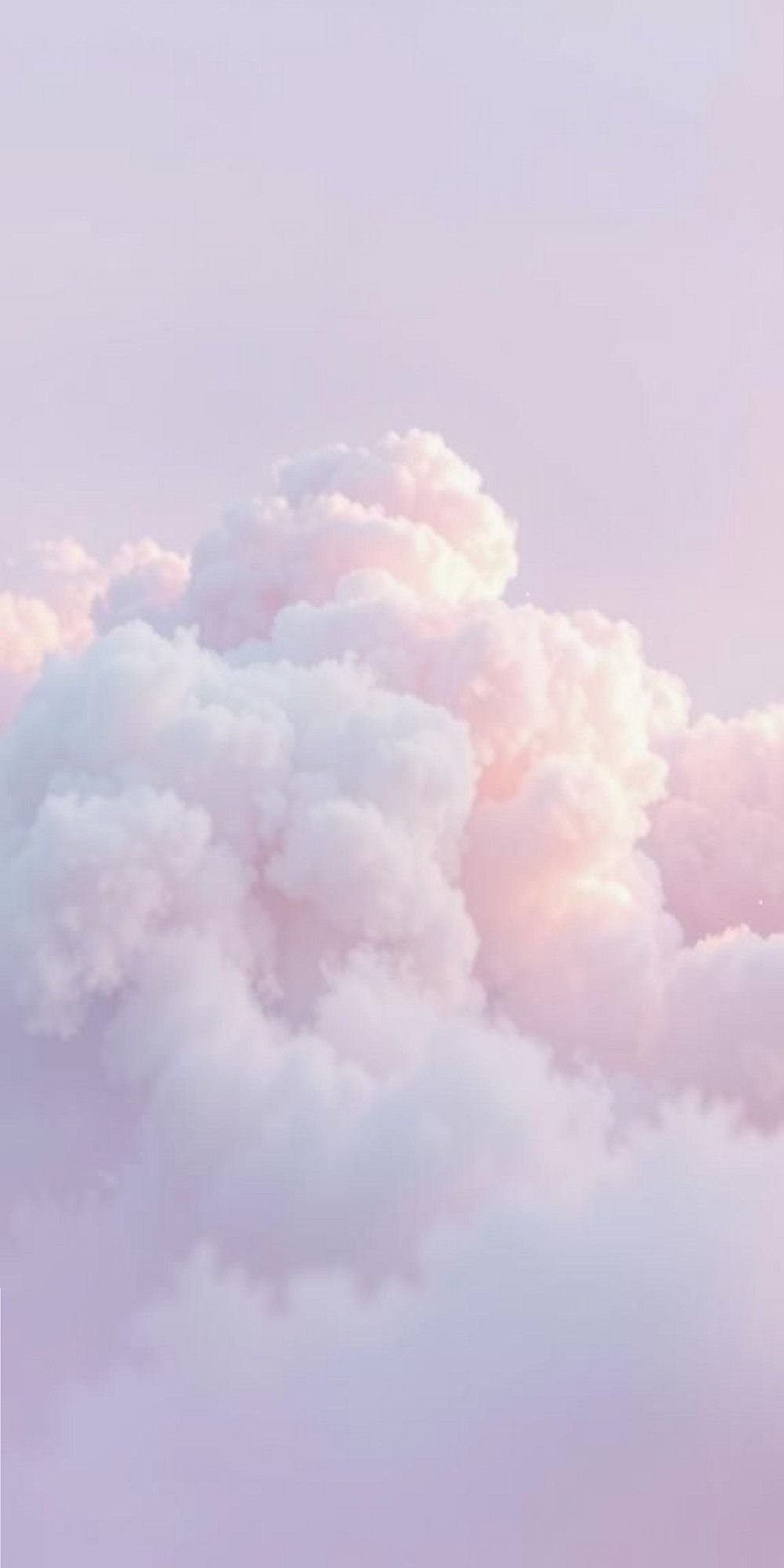 Soft Pastel Clouds Floating On Lavender Skies