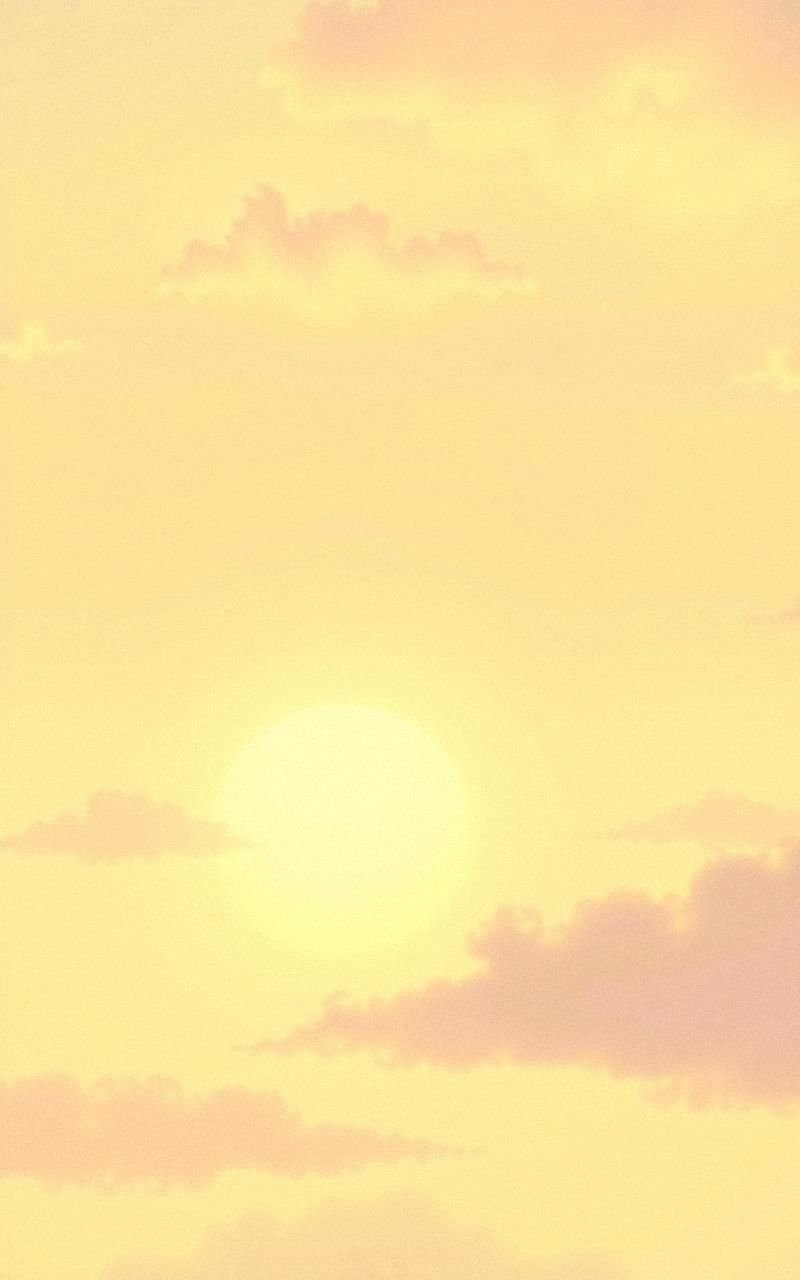 Pale Yellow Sunrise With Soft Lavender Clouds