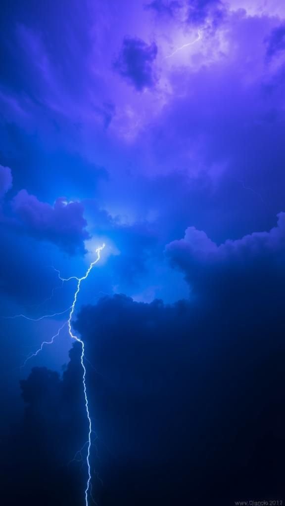 Electric Lightning Gradient Across Night Sky