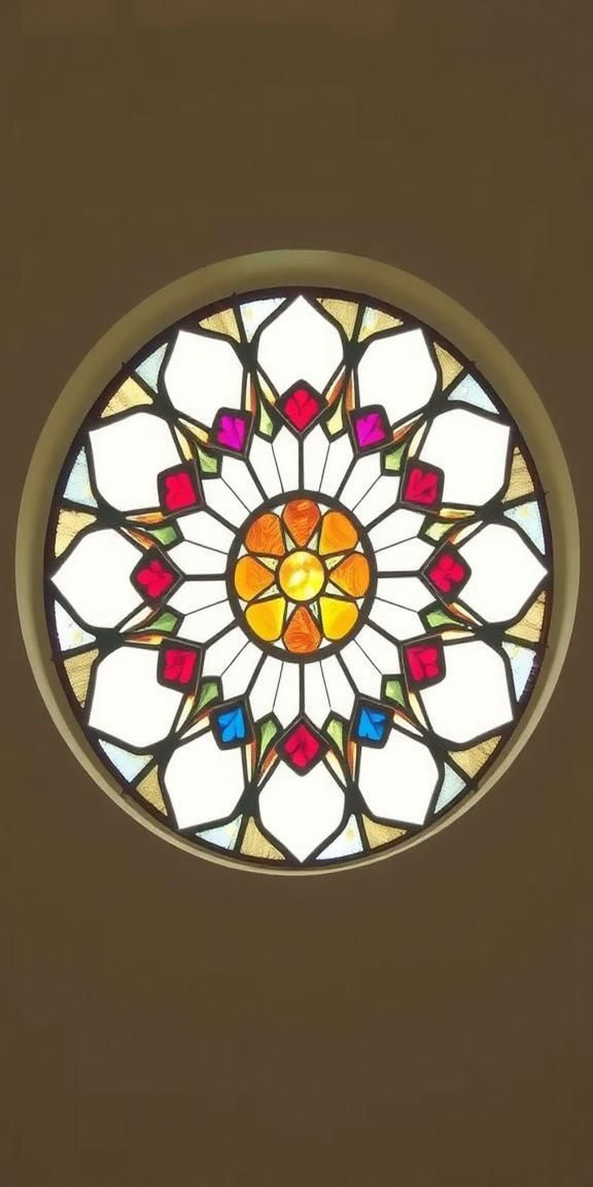 Rose Window Geometry In Stained Glass Hues